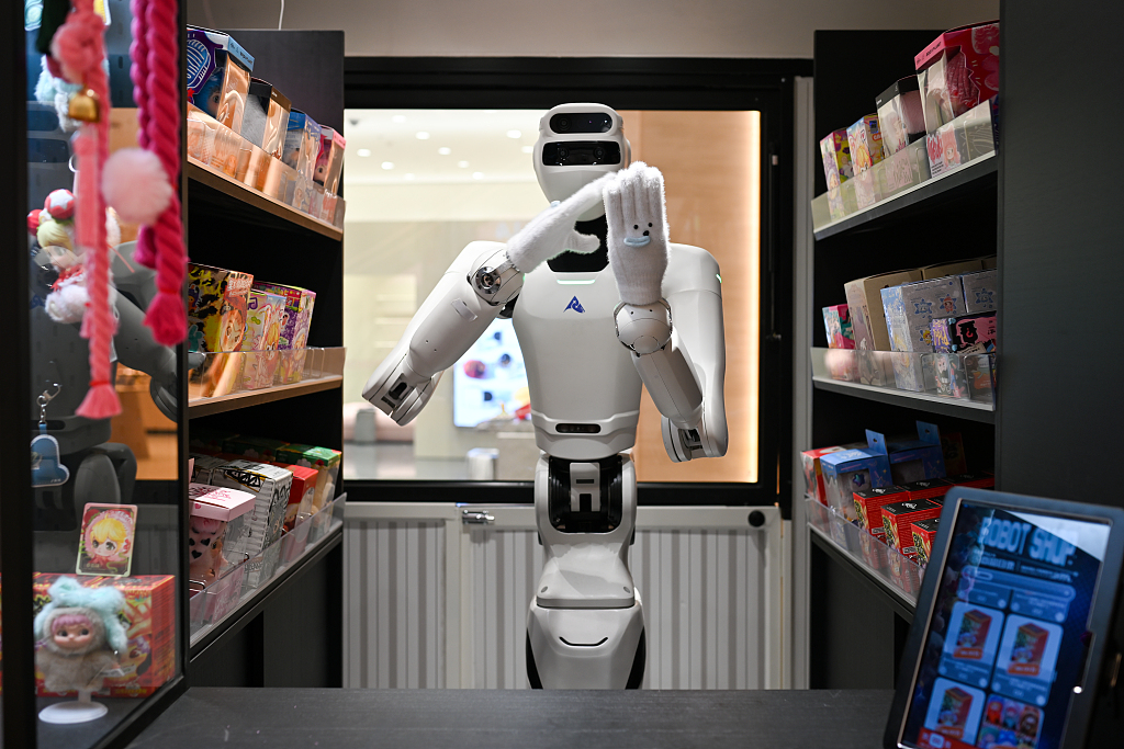 An AI assistant operates at a merchandise shop in Nanjing, east China's Jiangsu Province, June 5, 2026. /VCG